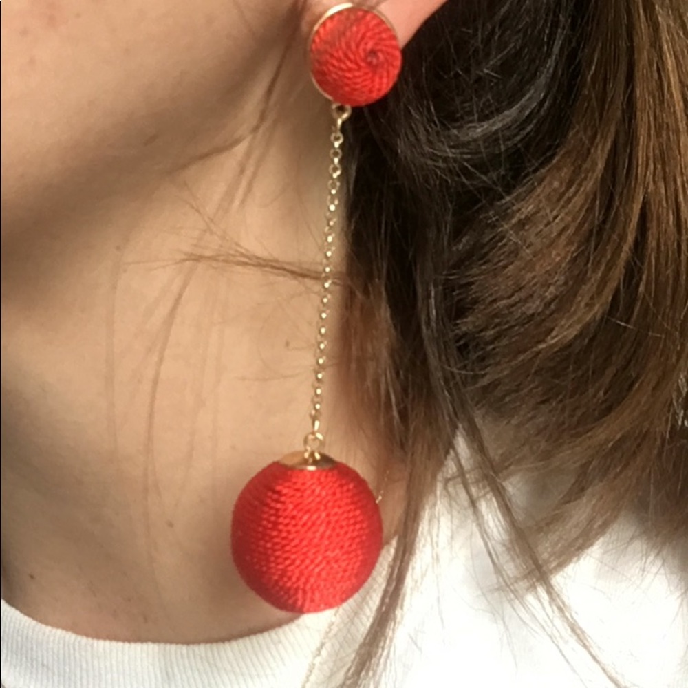 Red statement earrings